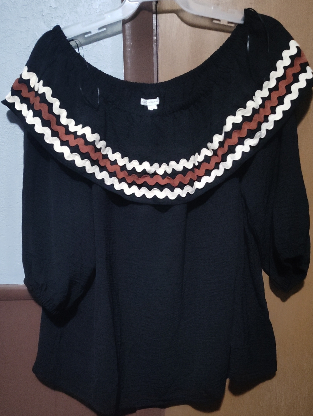 Cato Black Off-Shoulder Blouse with Cream and Brown Trim